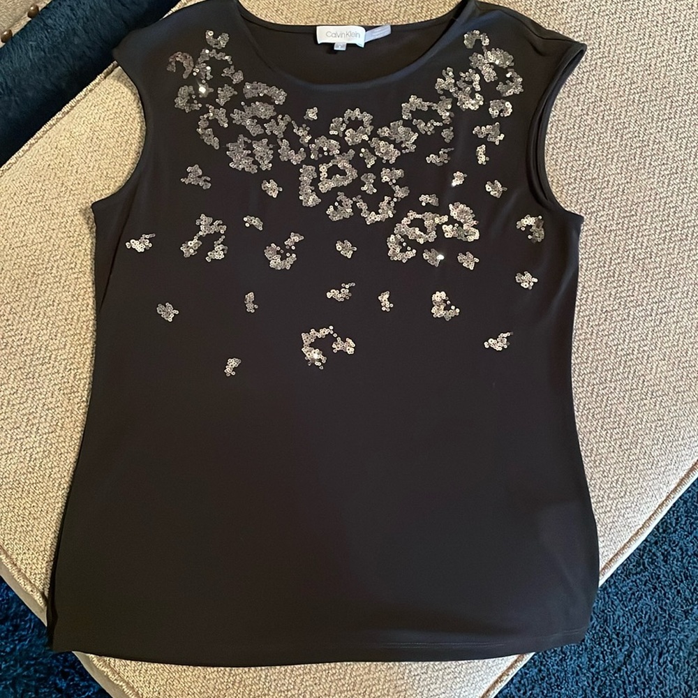 Like new Calvin Klein top with sequin detailing!